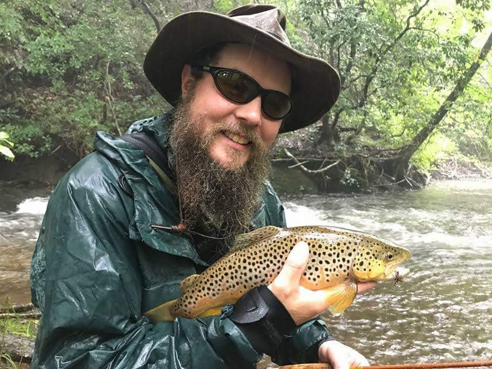 Photo of Harry fly fishing